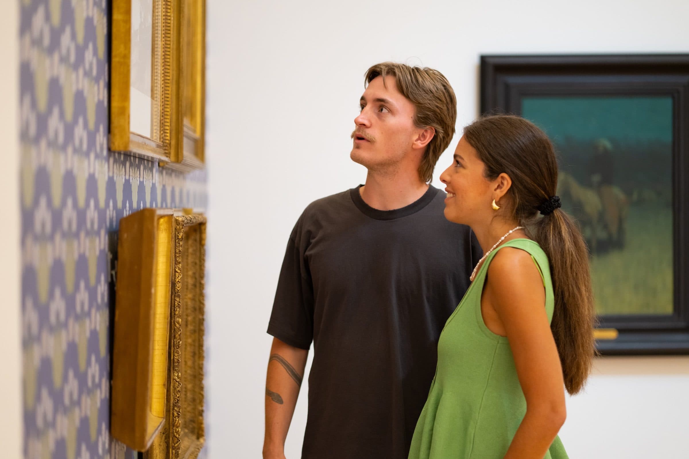 People enjoying the Foundations of American Art Gallery at Crystal Bridges