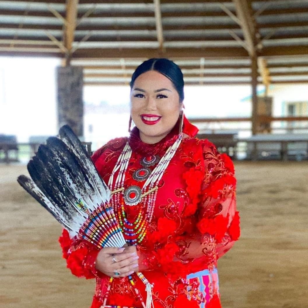 Traditional Attire with Feather Fan
